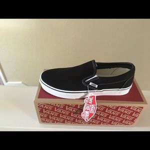 Vans black slip ons